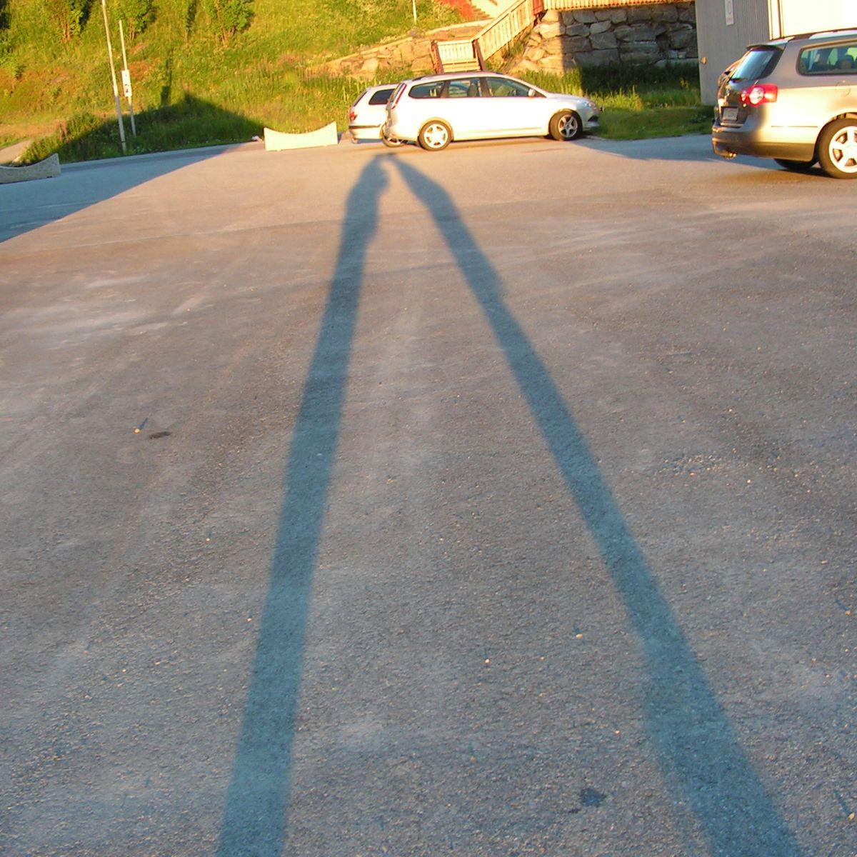 long shadow on the road in Norway